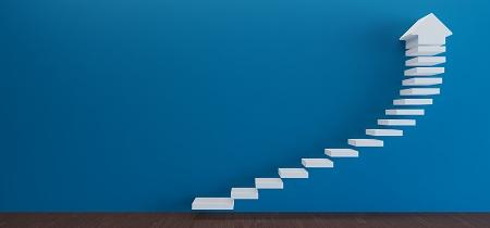 white staircase against blue wall